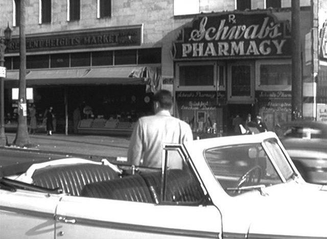 Southeast corner of Sunset Blvd and Crescent Heights Blvd showing Schwab's  Pharmacy and Googie's coffee shop, Los Angeles, circa late 1950s